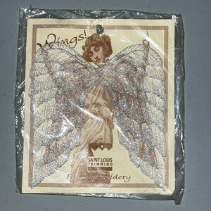 Saint Lois Trimming wings embroidered